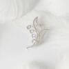 lily The "Lily of the Valley" silver brooch is elegant and pure, waiting for happiness to return.