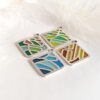 Four Seasons Imagery D3 The Four Seasons Imagery collection blends the Plique-à-jour enamel technique with the elegance of Chinese character aesthetics. The enamel shines like stained glass—translucent and ever-shifting with the light—evoking scenes of poetry and painting.