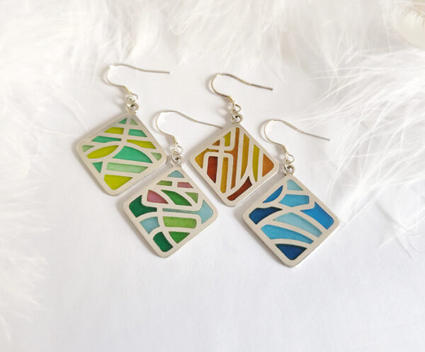 Four Seasons Imagery “Four Seasons Imagery” handcrafted enamel earrings featuring openwork cloisonné technique, delicately capturing the colors and moods of spring, summer, autumn, and winter in translucent detail.