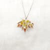 MapleSplendo1 Handcrafted Maple Splendor Pendant in sterling silver with Plique-à-jour enamel, autumn maple leaf necklace capturing warm light.