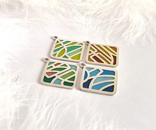 Four Seasons Imagery D1 The Four Seasons Imagery collection blends the Plique-à-jour enamel technique with the elegance of Chinese character aesthetics. The enamel shines like stained glass—translucent and ever-shifting with the light—evoking scenes of poetry and painting.