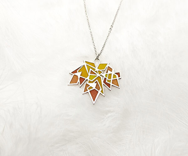 MapleSplendo1 Handcrafted Maple Splendor Pendant in sterling silver with Plique-à-jour enamel, autumn maple leaf necklace capturing warm light.