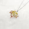 MapleSplendor2 Handcrafted Maple Splendor Pendant in sterling silver with Plique-à-jour enamel, autumn maple leaf necklace capturing warm light.
