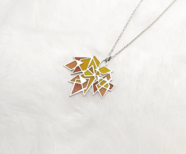 MapleSplendor2 Handcrafted Maple Splendor Pendant in sterling silver with Plique-à-jour enamel, autumn maple leaf necklace capturing warm light.