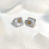 Perfect for everyday wear or special occasions, these hand-painted enamel stud earrings showcase a delicate daisy flower design that exudes natural elegance and artistry.