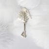 The silver key brooch, designed as a lush tree, symbolizes the prosperity and connection of life. It is suitable for wearing on various occasions and adds a unique personality.