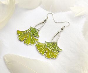A pair of ginkgo leaf earrings in translucent enamel that showcase natural elegance and vivid green, perfect for everyday wear and special occasions.