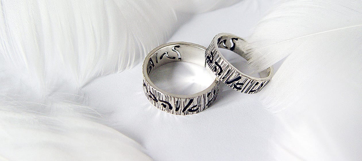 Symbolic covenant rings, showcasing intricate craftsmanship and deep personal meaning, perfect for expressing love and commitment.