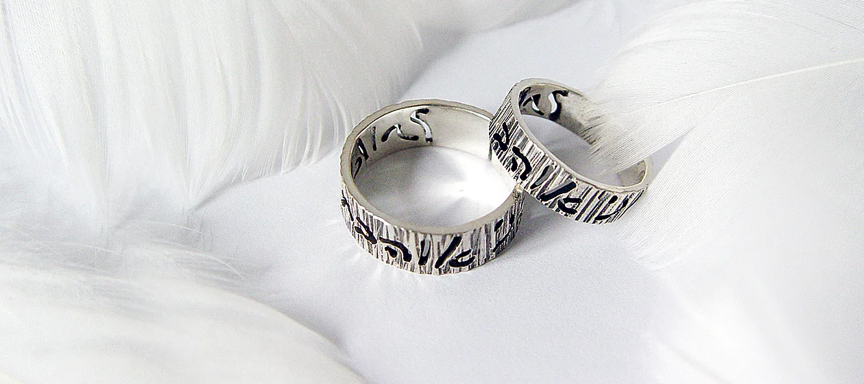 Symbolic covenant rings, showcasing intricate craftsmanship and deep personal meaning, perfect for expressing love and commitment.