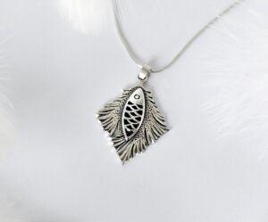 925 silver handmade necklace with a fish design, symbolizing "abundance and prosperity" and good fortune, inspired by Matthew 4:19, combining the traditional meaning of Chinese New Year.