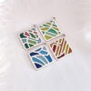 “Four Seasons Imagery” handcrafted enamel earrings featuring openwork cloisonné technique, delicately capturing the colors and moods of spring, summer, autumn, and winter in translucent detail.